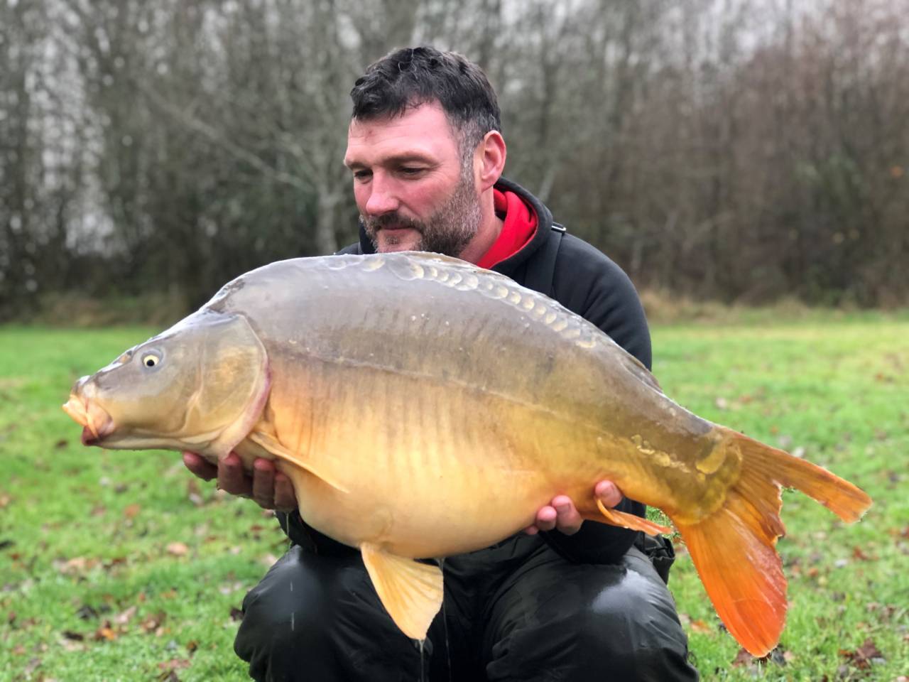 rob hughes with a fine mirror carp